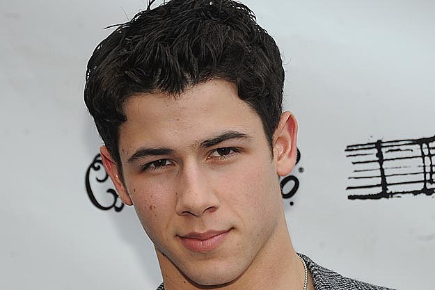 Nick Jonas Falls Into a Hole on Stage: 'Ouch' | Us Weekly